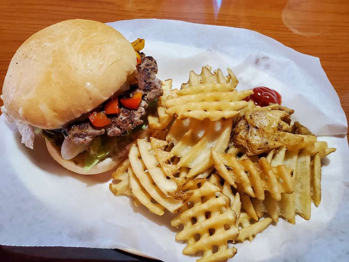 Loaded burger with cheese and fries