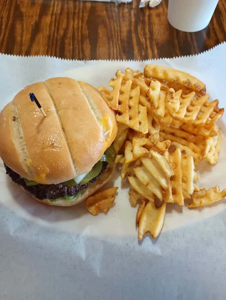 Loaded burger with cheese and fries