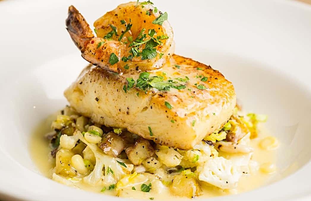 Pan seared halibut with shrimp and beurre blanc