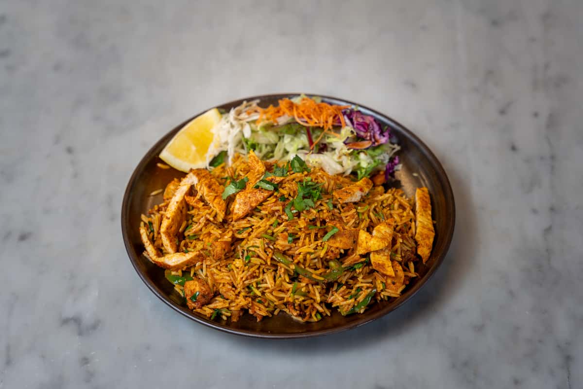 Biryani Style Somali rice cooked with chicken and beef suqaar