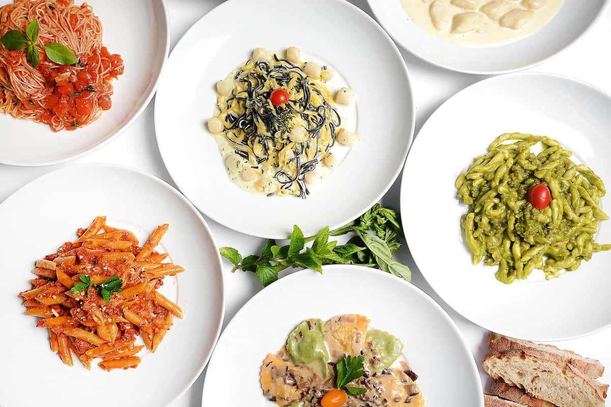 Assorted Italian dishes including pasta and appetizers served at Celestino Pasadena
