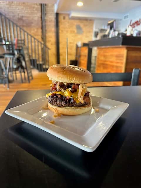 Burnt End Burger piled high with toppings