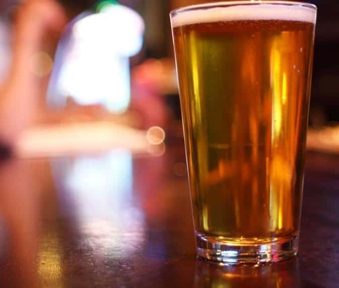 Pint of beer on a bar-top