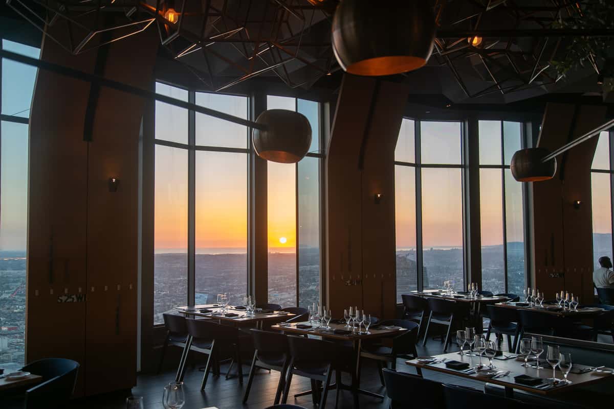 Dining room at 71Above with panoramic sunset views over Los Angeles skyline