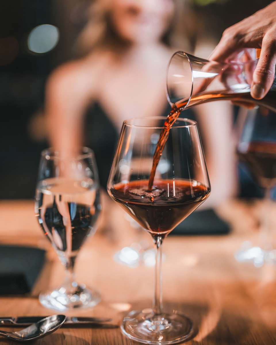 Beverage Director Catherine Moral and Executive Chef Javier Lopez tasting wines and seasonal dishes together at 71Above to refine perfect pairings.