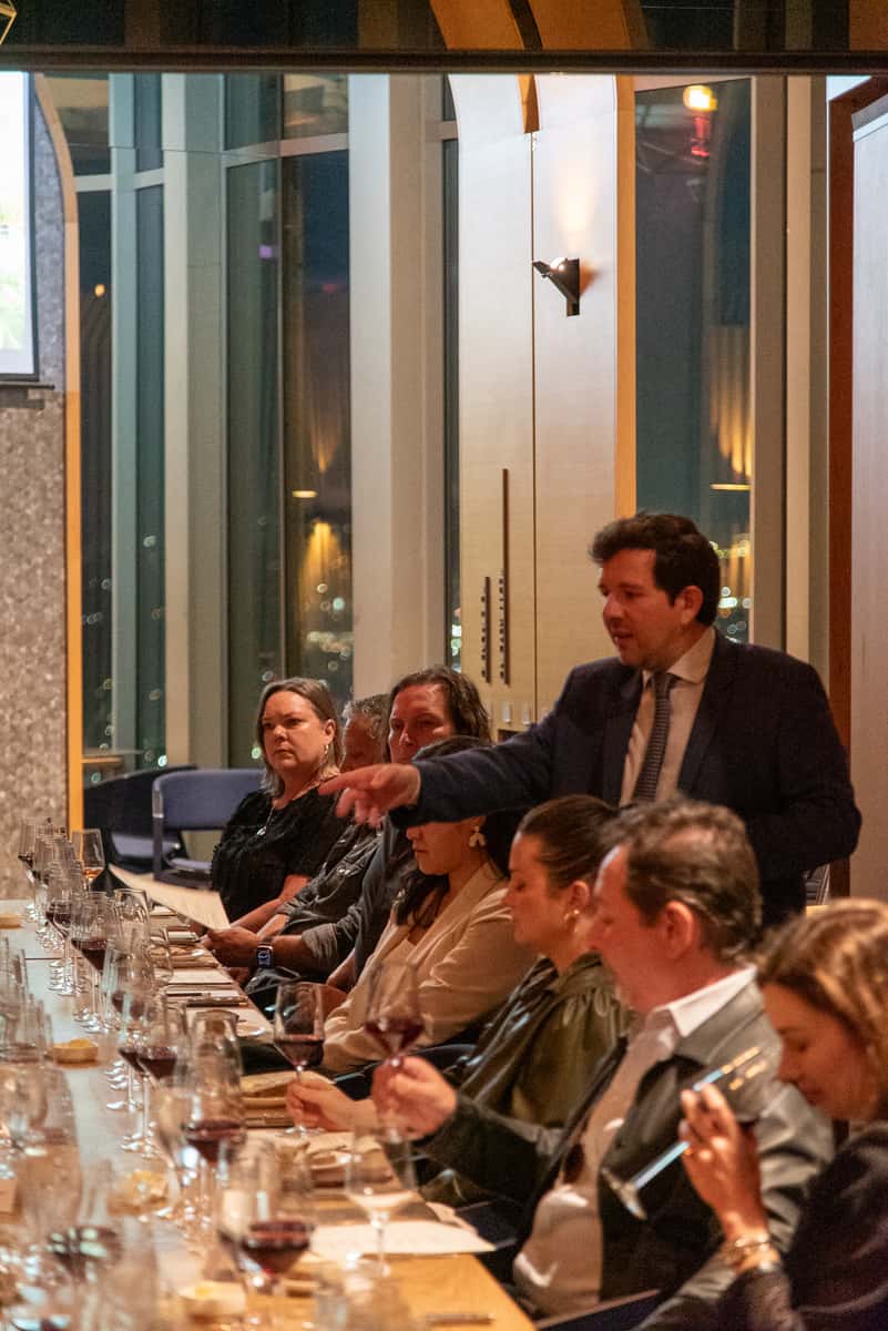 Guests attending a wine dinner event at 71Above in Downtown Los Angeles, featuring curated pairings and panoramic city views