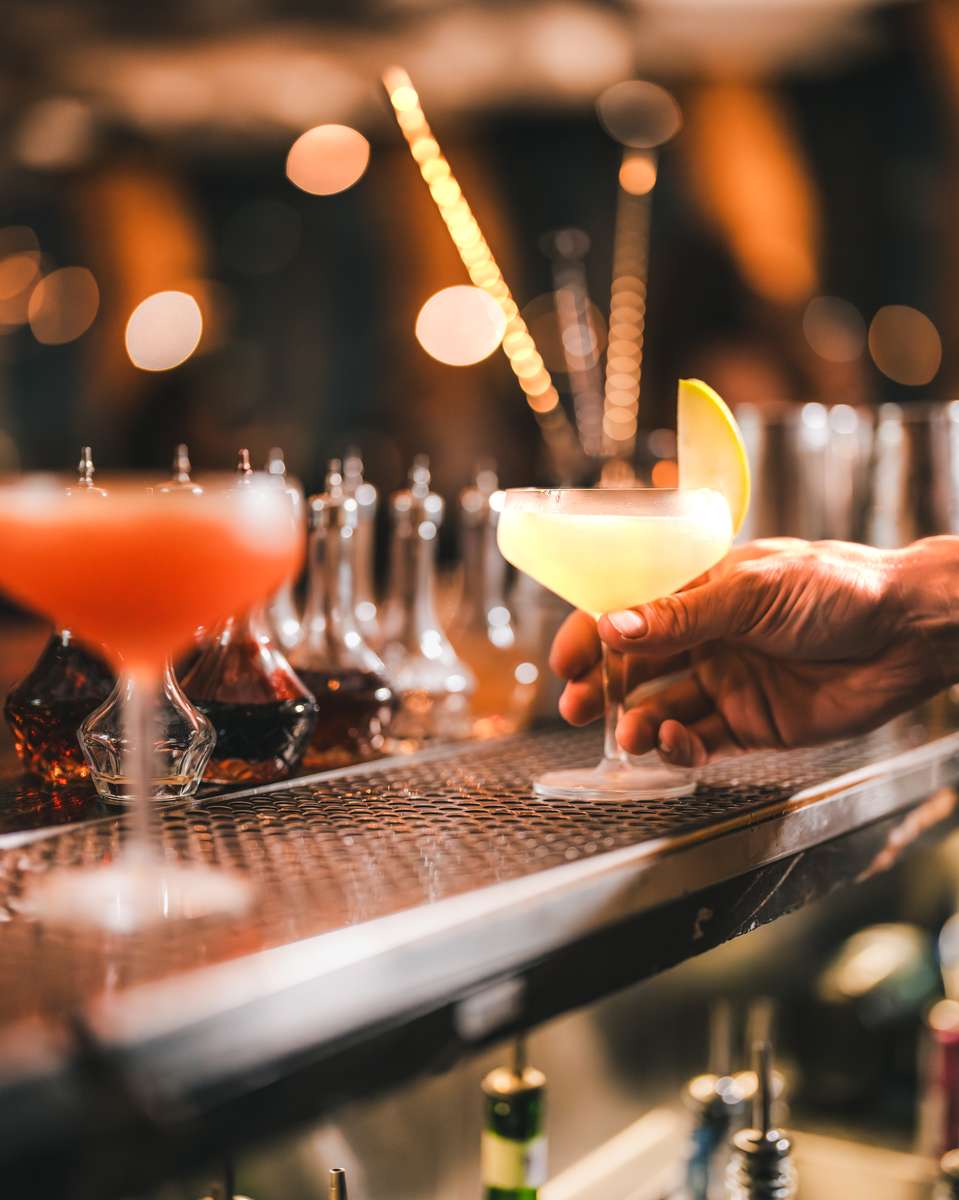 Craft cocktails at 71Above bar with Los Angeles skyline