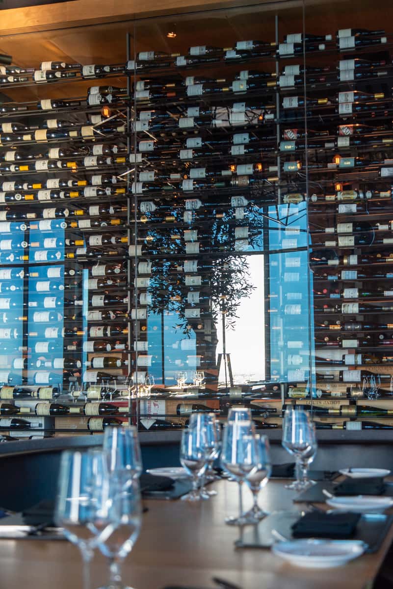 Wine wall at 71Above showcasing a curated selection of old-world and new-world wines inside the Downtown Los Angeles restaurant.