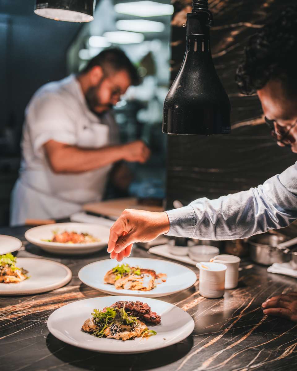 Seasonal fine dining dish and wine pairing served at a private dining event at 71Above in Los Angeles.