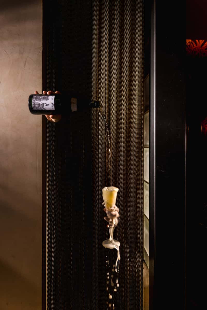 Passion in Motion cocktail poured