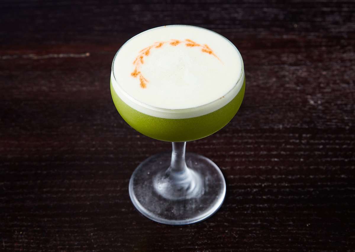 green cocktail beverage