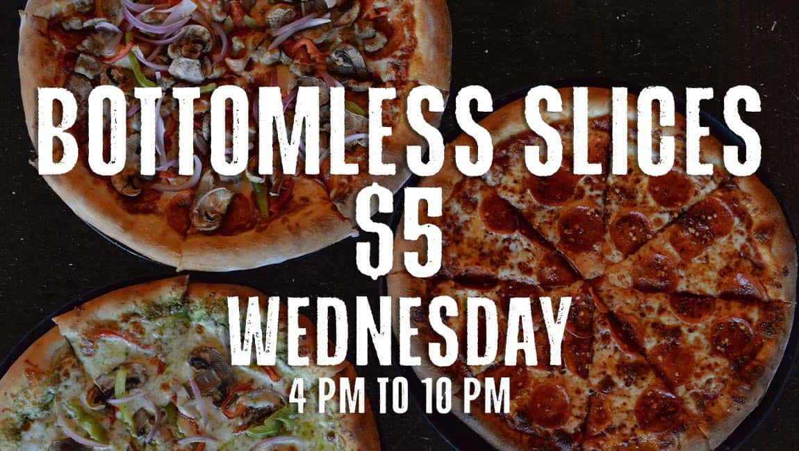 pizzas on tables with writing bottomless slices $5 wednesdays