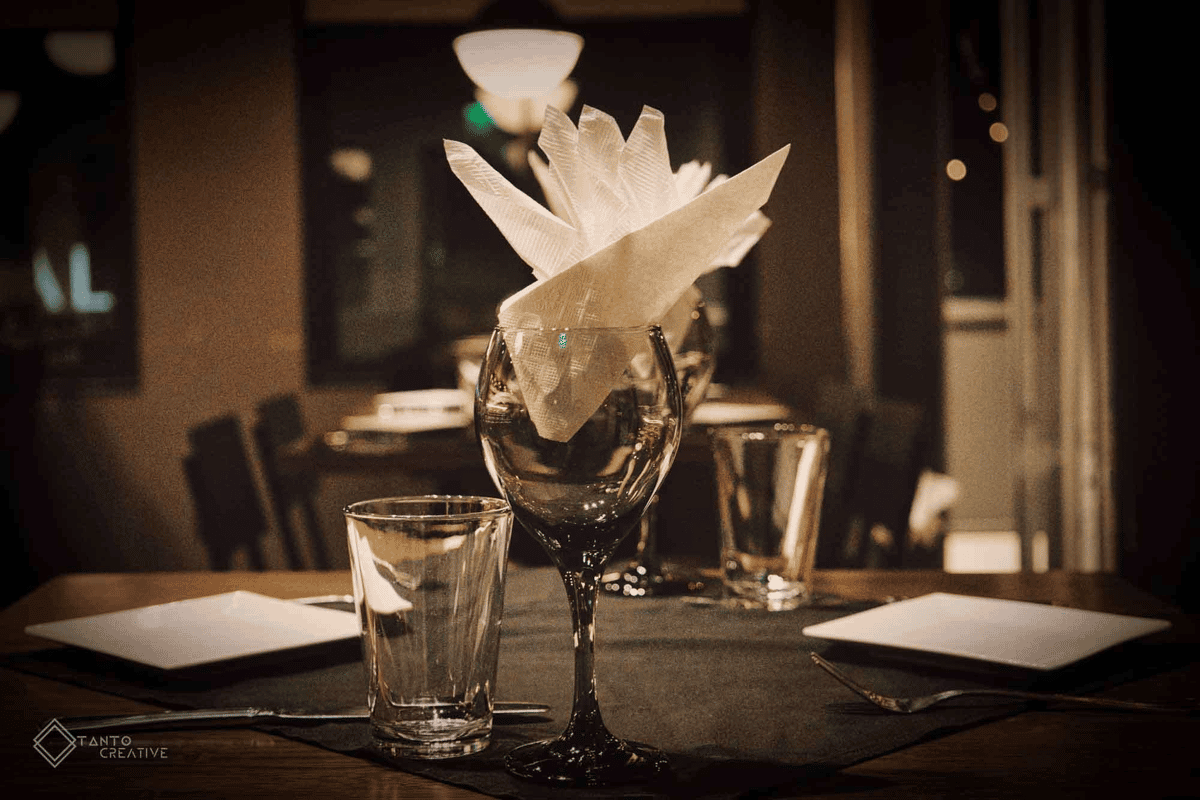 Glass with napkin inside, table settings
