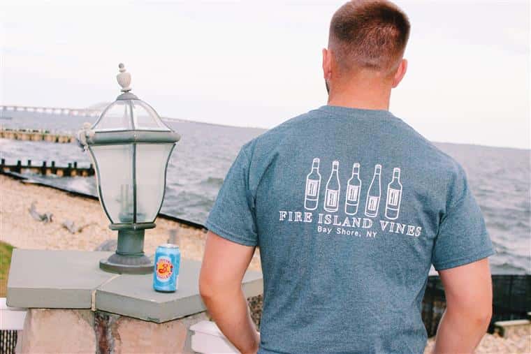 man wearing a Fire Island Vines Heather Grey Tee