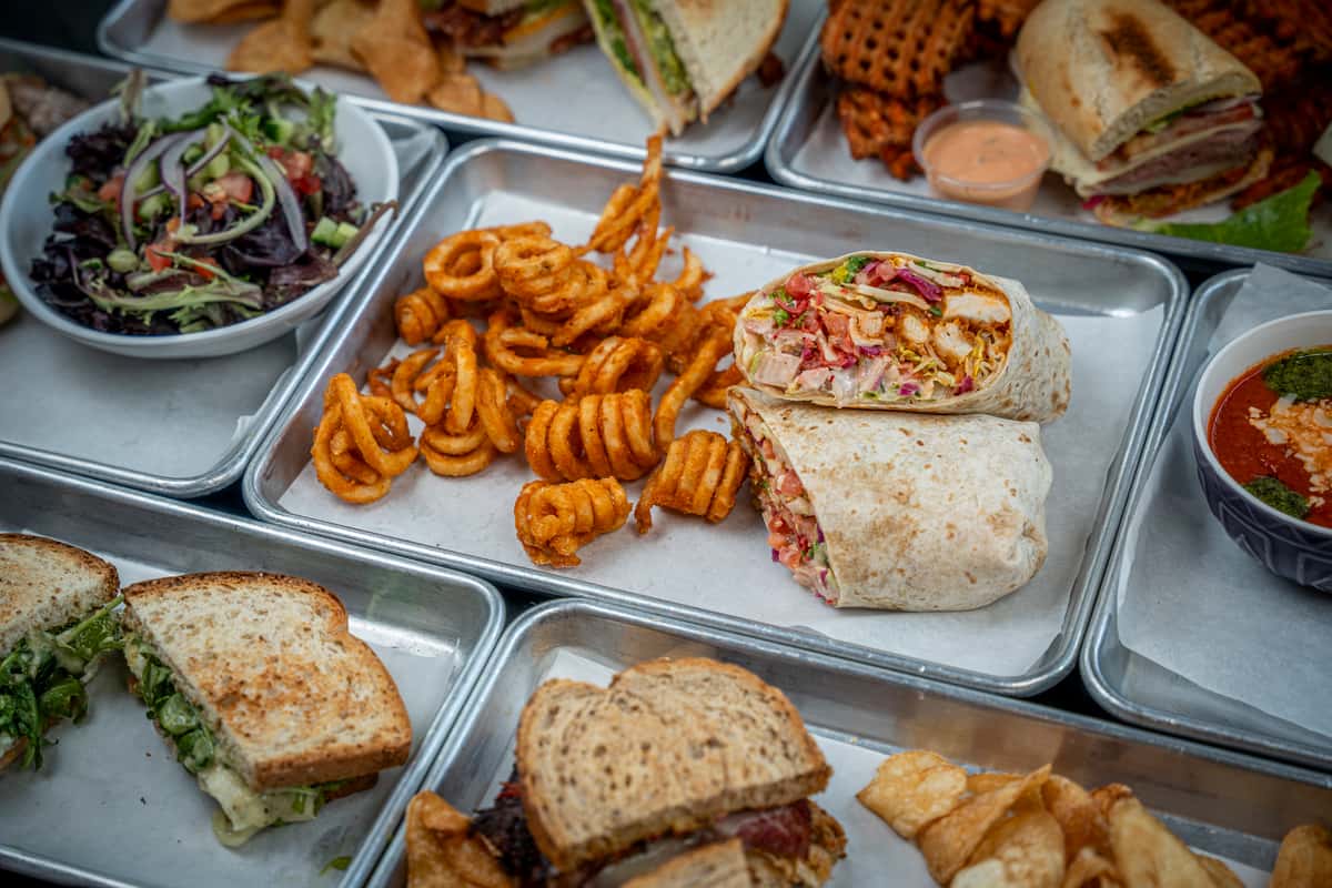 Stacked sandwich combo on a table