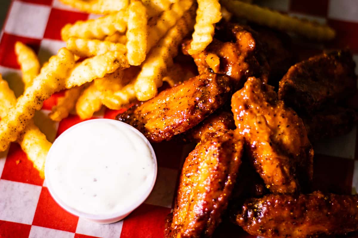 close up of chicken and fries