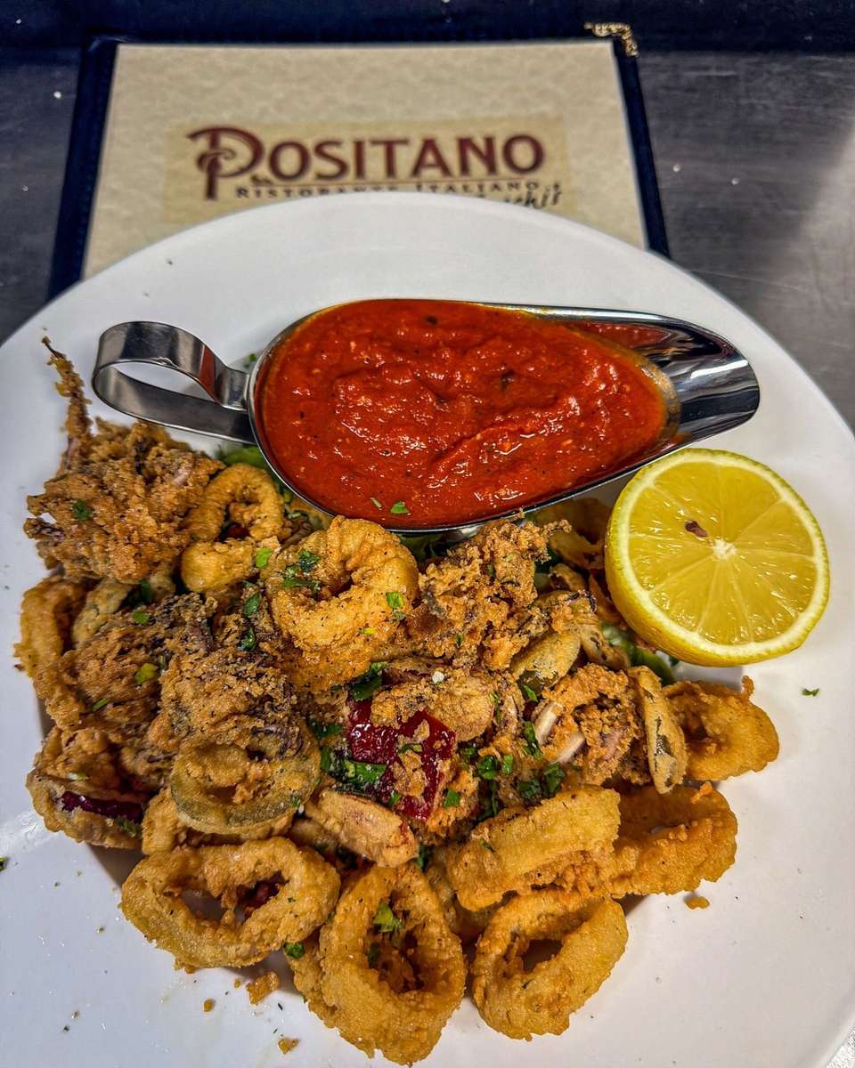 Crispy fried calamari with marinara sauce and lemon served at Positano Ristorante Italiano