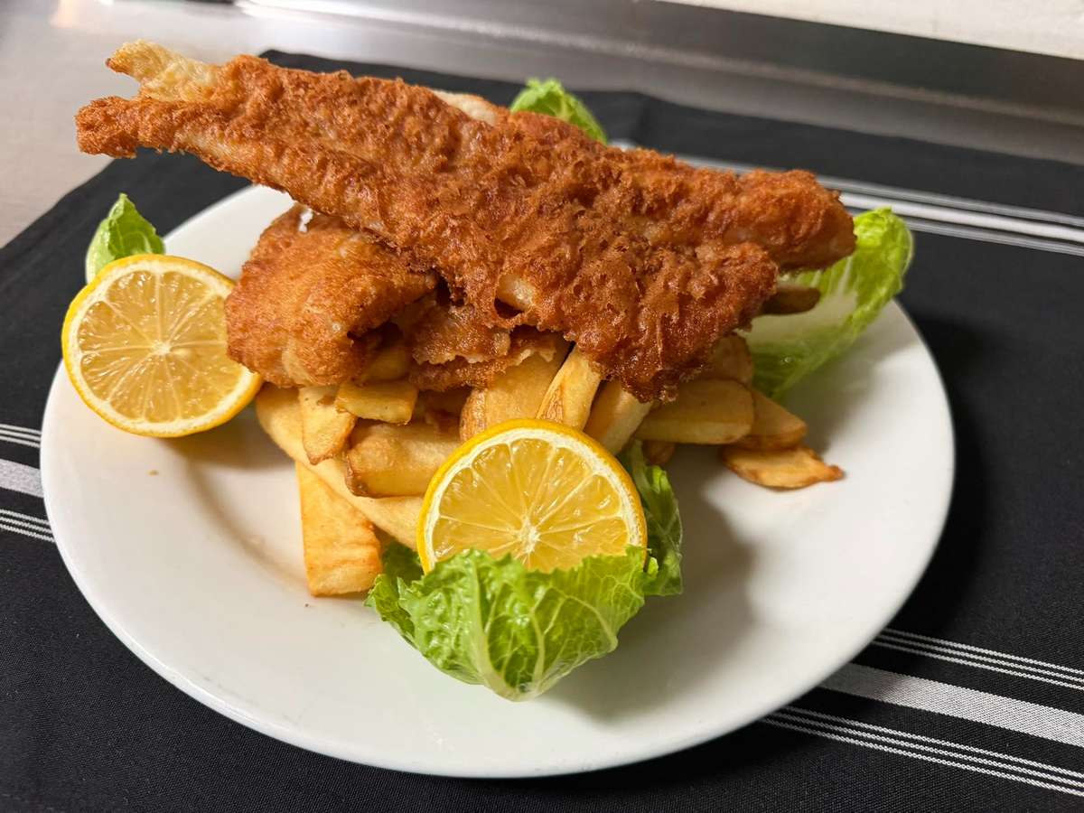Crispy fried fish and seasoned fries served at Positano Ristorante Italiano in Palm Harbor