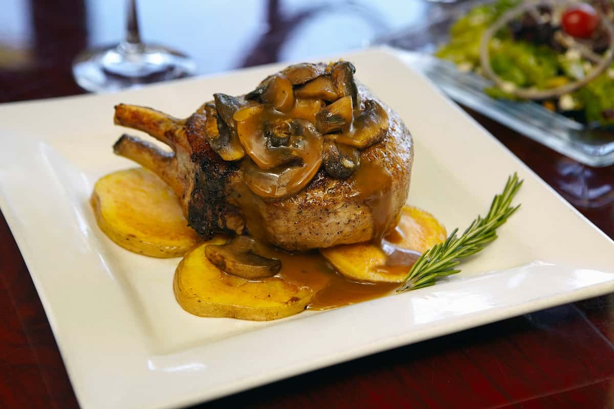 Filet mignon topped with mushroom sauce served with roasted potatoes at Positano Ristorante Italiano