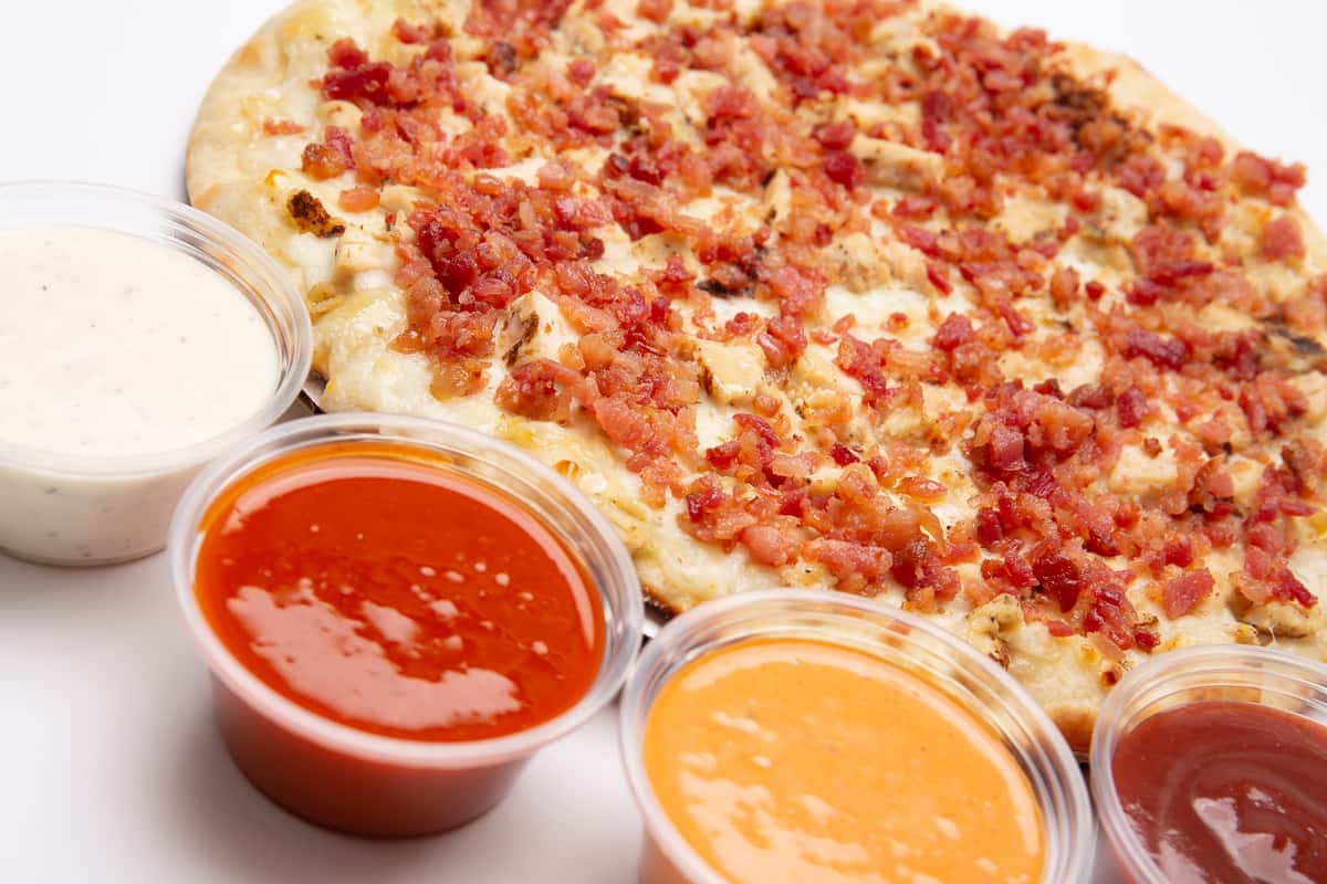 Bacon bits pizza with sauces