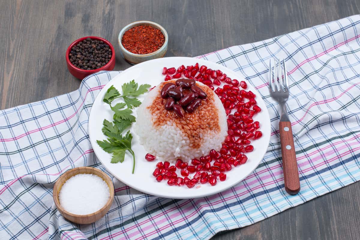 steamed rice with pomegranate seeds