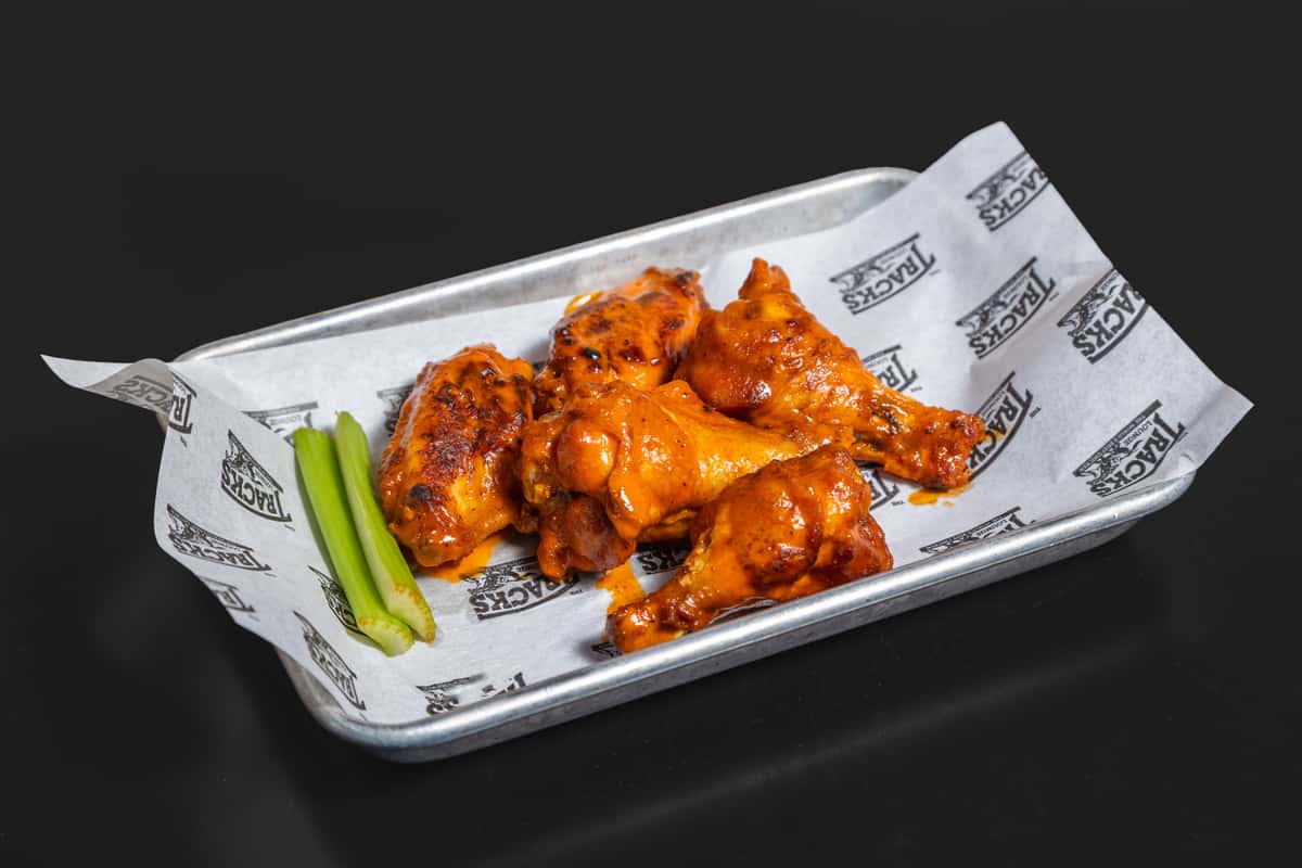 Mild flavored chicken wings with celery
