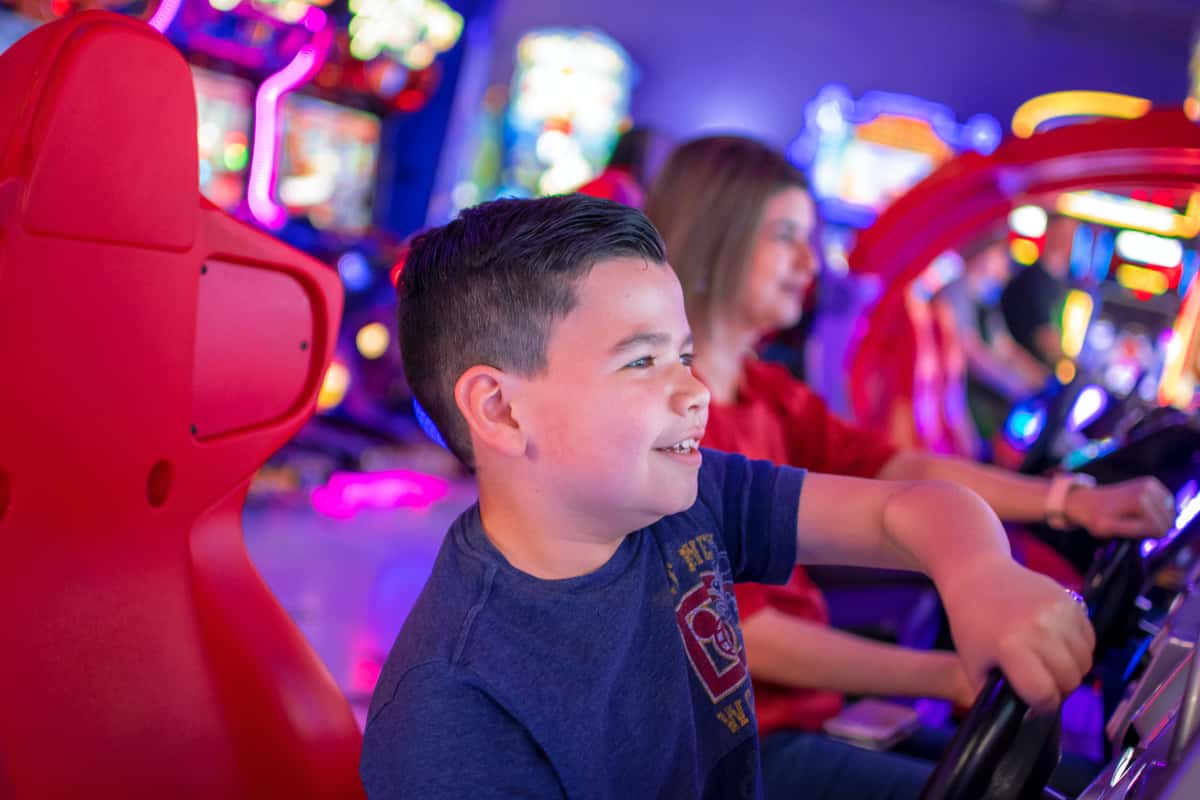 Child playing in the arcade
