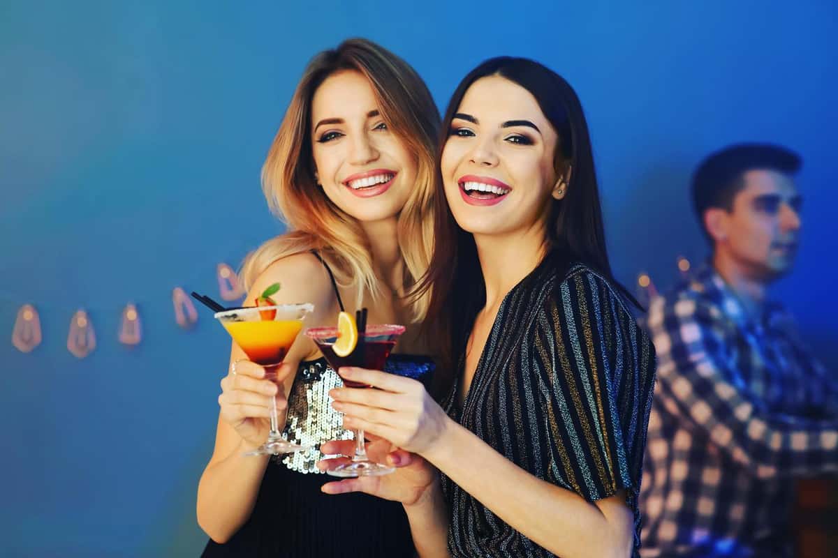 two ladies with cocktails