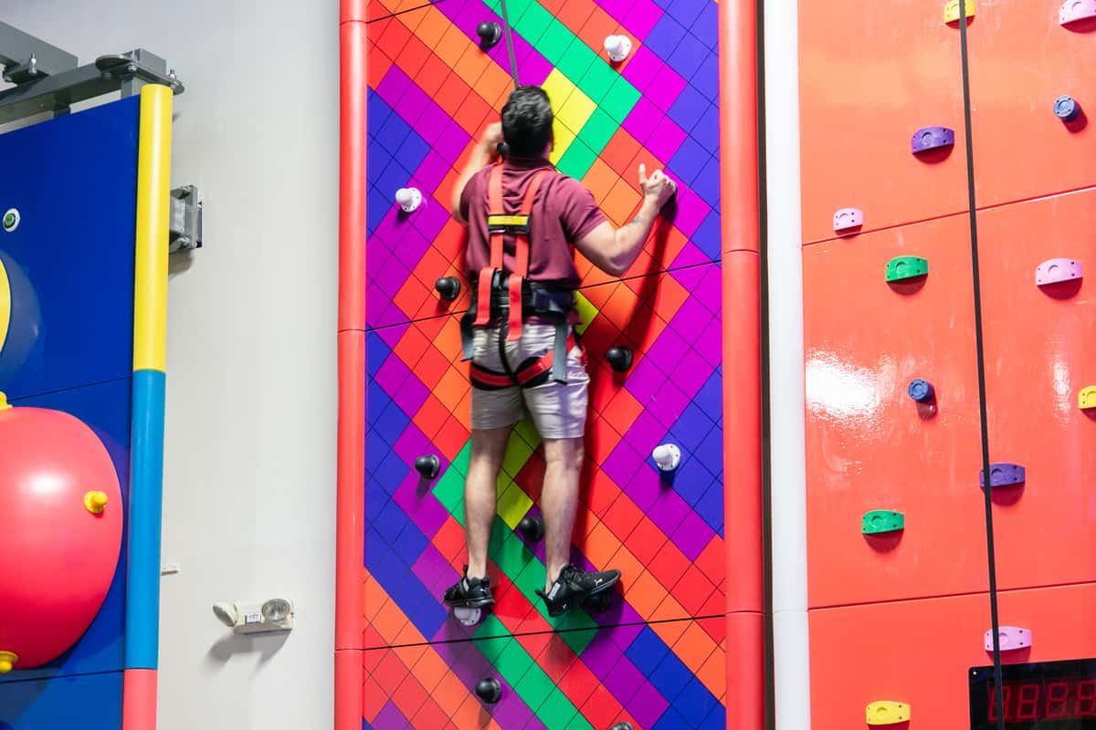 Man climbing indoor climbing wall