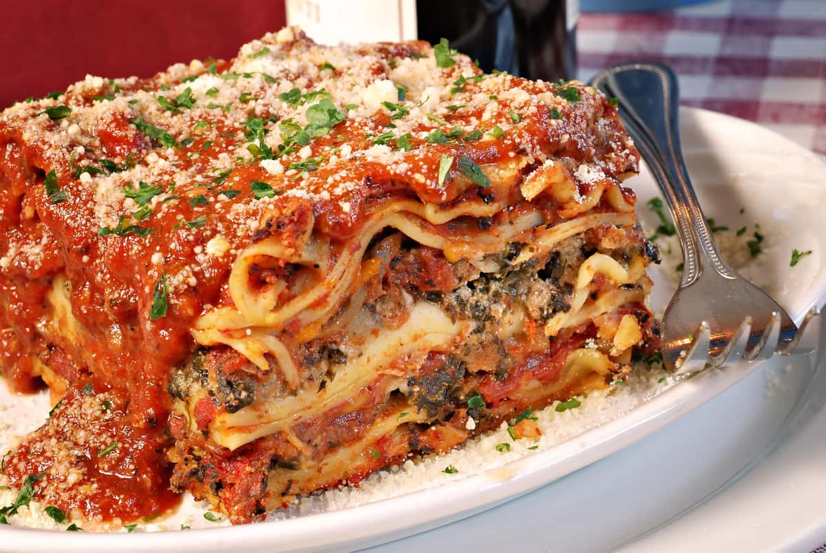 plate with lasagna and a fork