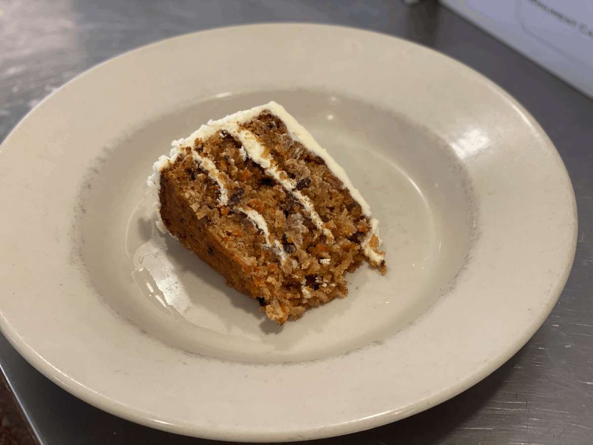 Treat yourself to the breakfast of champions…. We got some carrot cake! |  Petite Clouet Cafe | NewsBreak Original