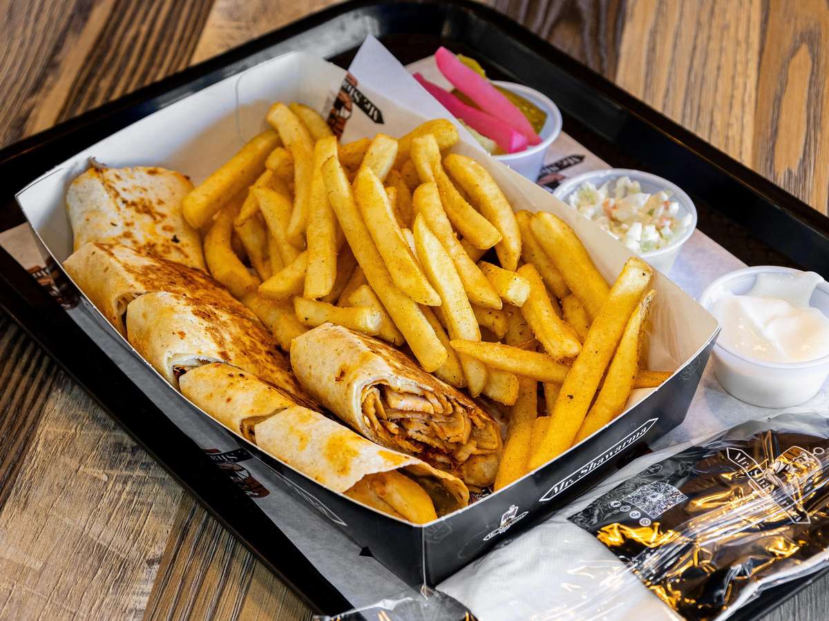 Wrap Cut into 5 bite size pieces, served with pickles, coleslaw, sauce, and Fries