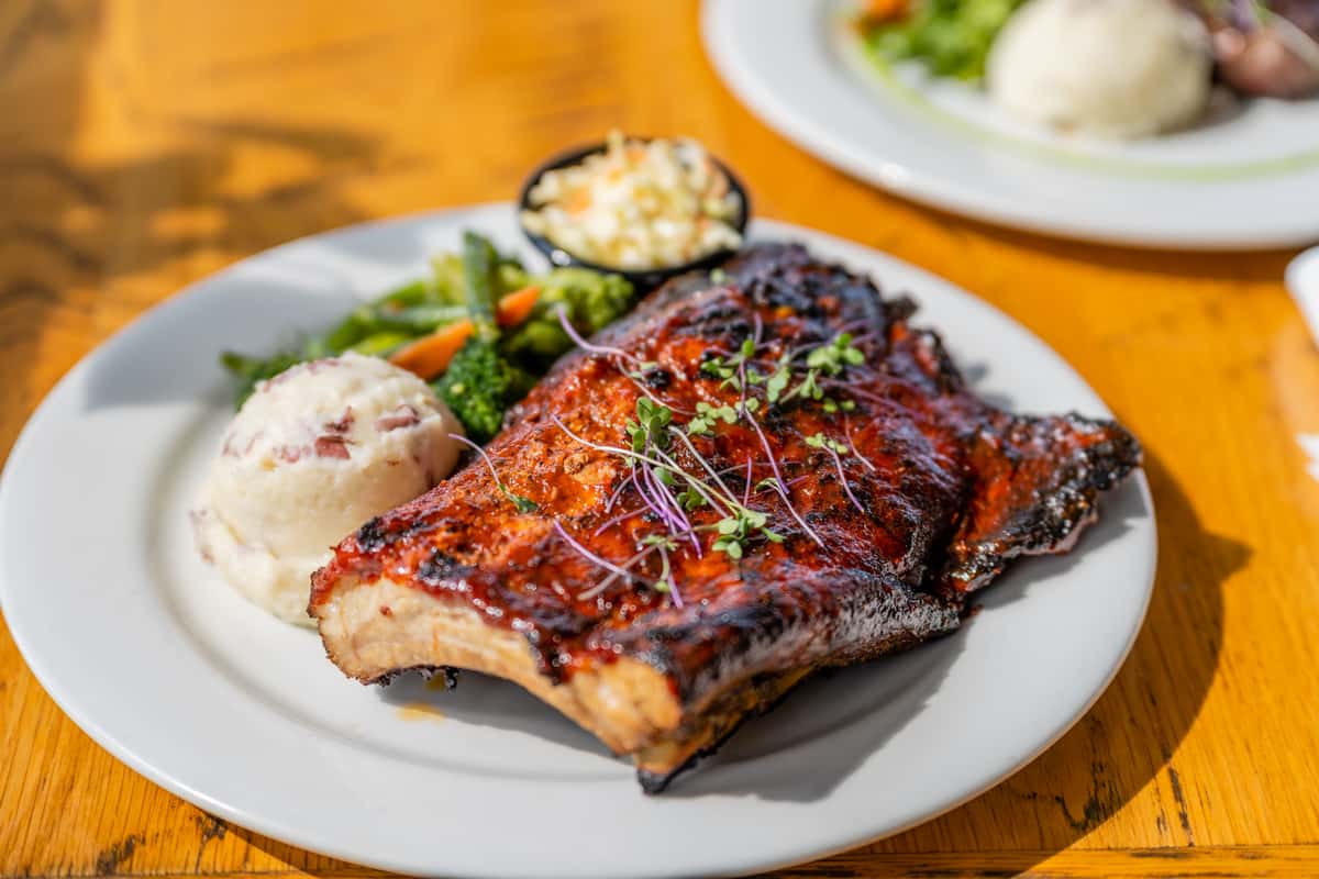 Fosters BBQ Ribs with mashed potatoes and sauteed veggies