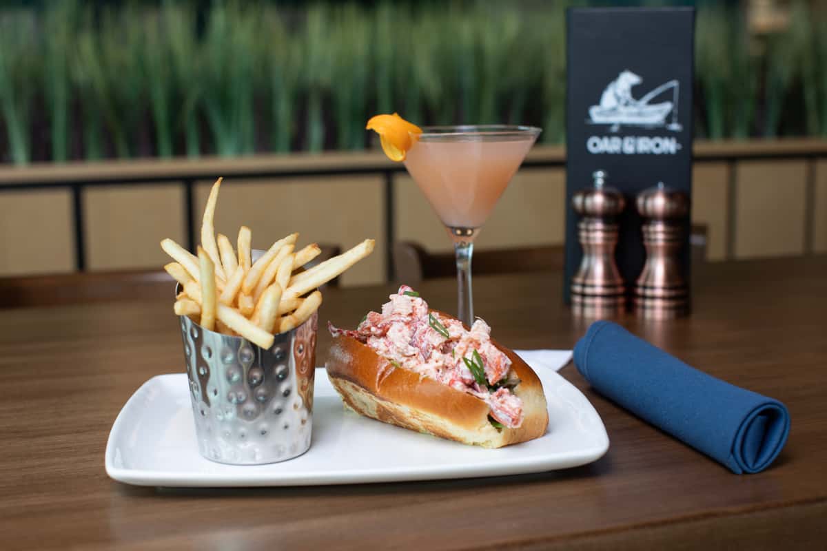 lobster roll with french fries and cosmo