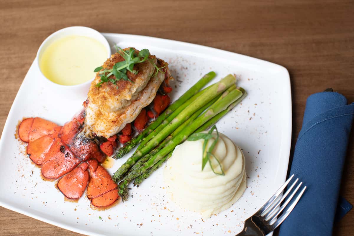 Baked stuffed lobster tail with mashed potatoes