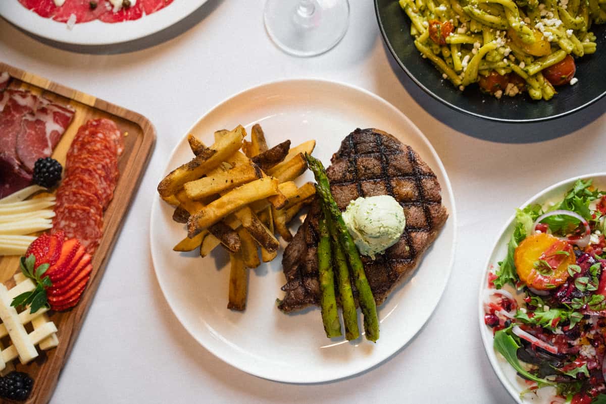 Steak, french fries and asparagus