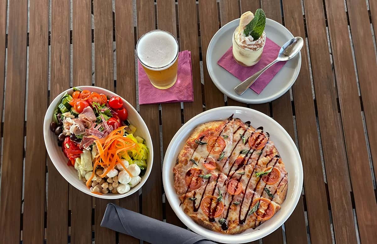 pizza, beer, salad, and tiramisu