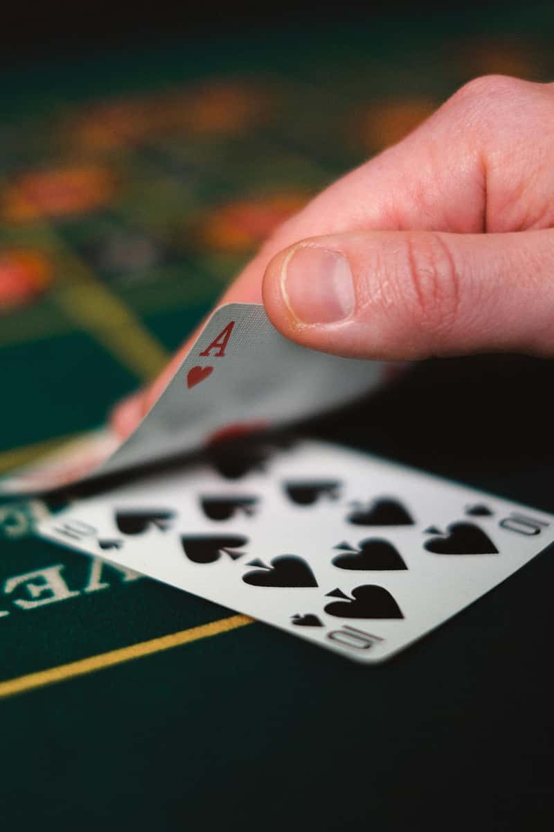 Hand playing cards