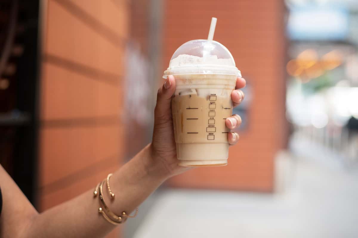 woman holding drink