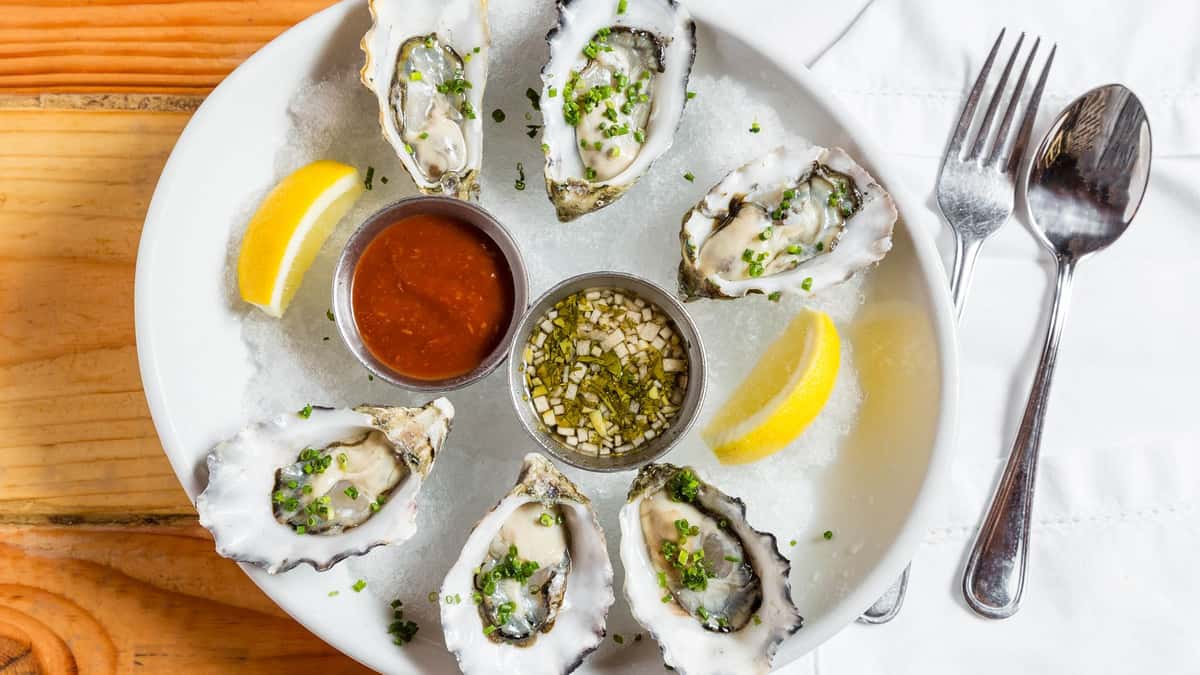 Freshly Shucked Oysters on the Half Shell Seasonal Menu Vine