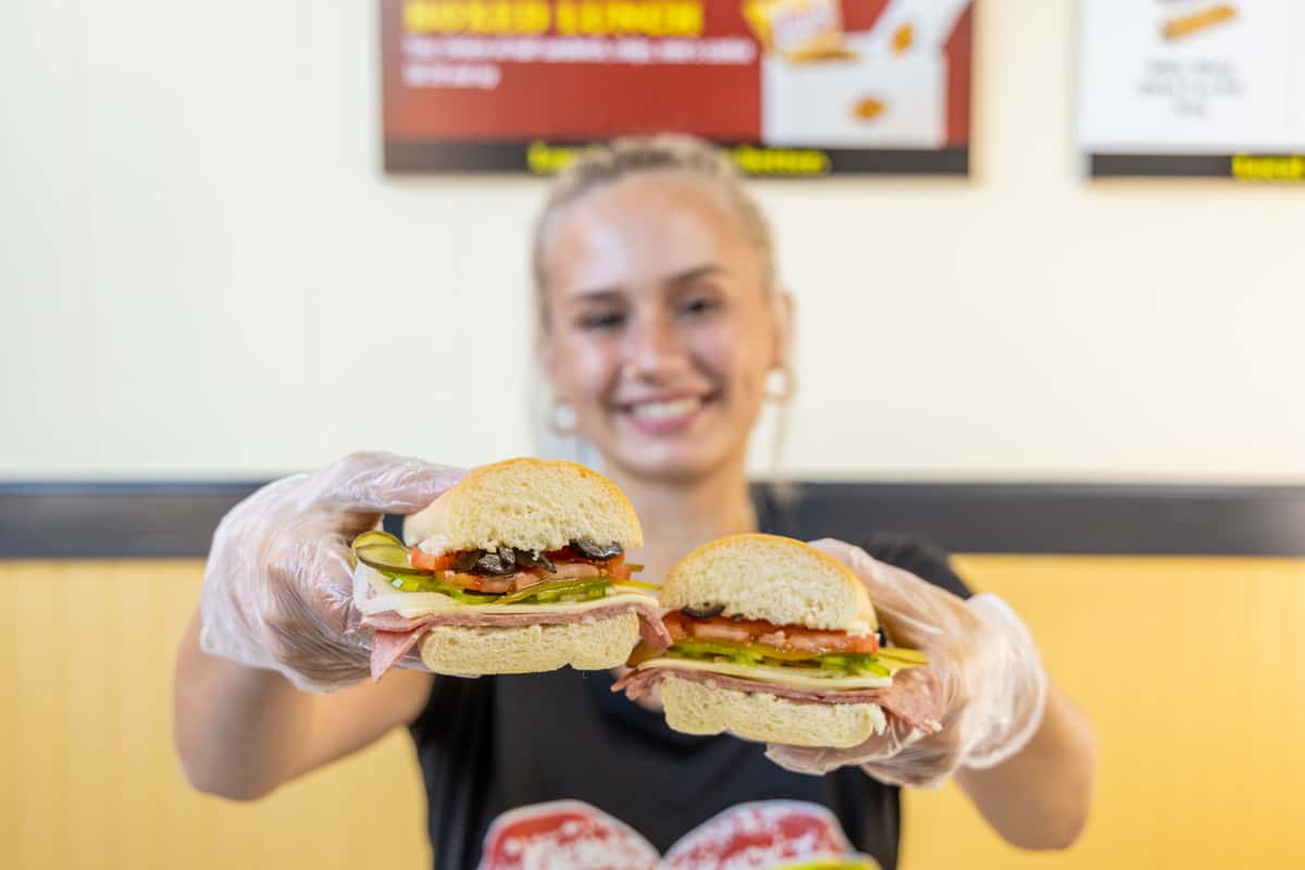 Employee holding a sub