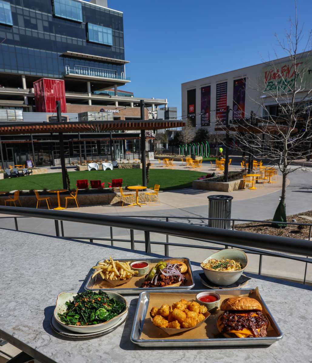 Hamburger, tots and sides with a view