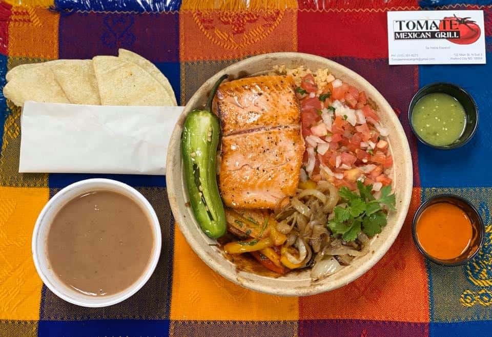 grilled fish with pico, tortillas, and sides