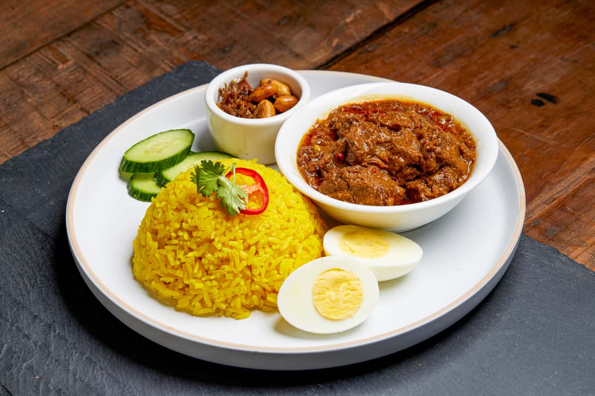 rice with meat, eggs and veggies
