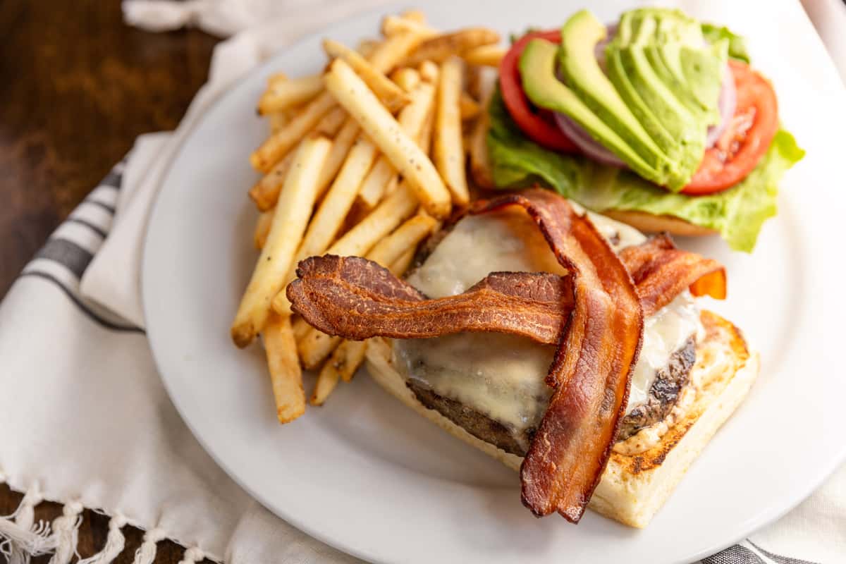 Bacon Swiss Burger with Avocado Menu Odyssey World Cafe