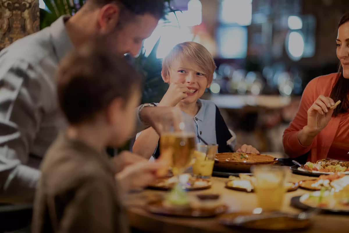 A family enjoying a meal at Chuck A Rama