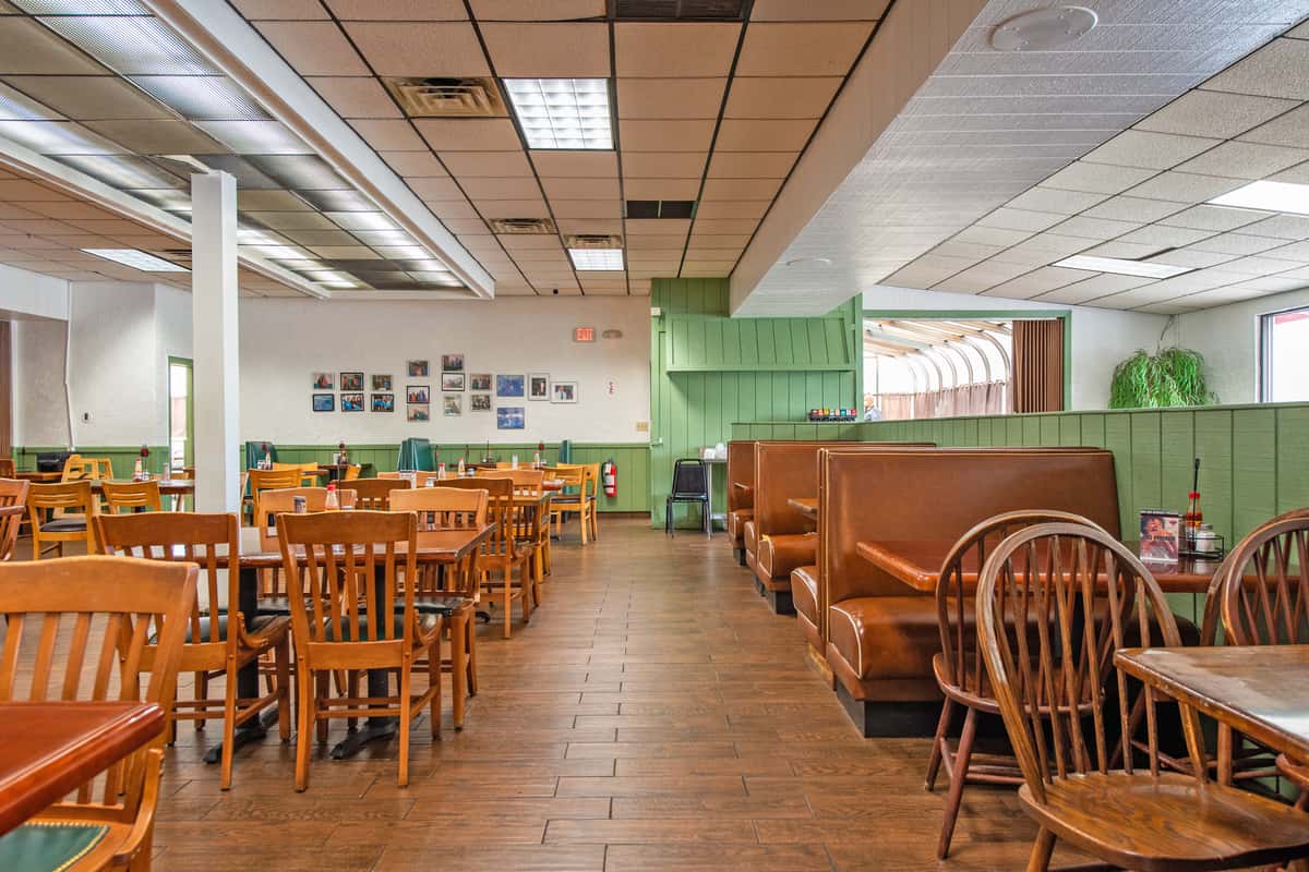 Dining room area with tables and chairs
