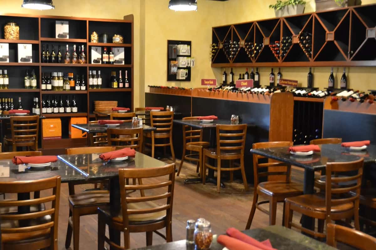Downstairs dining room with wine racks and retail area