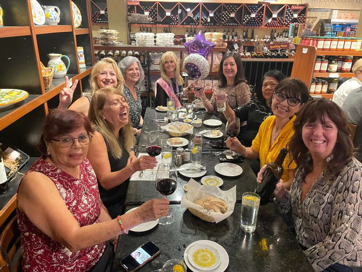 A large group gathered around a table