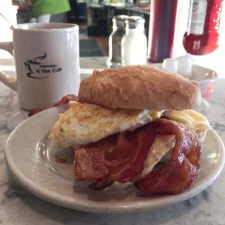 breakfast sandwich with coffee